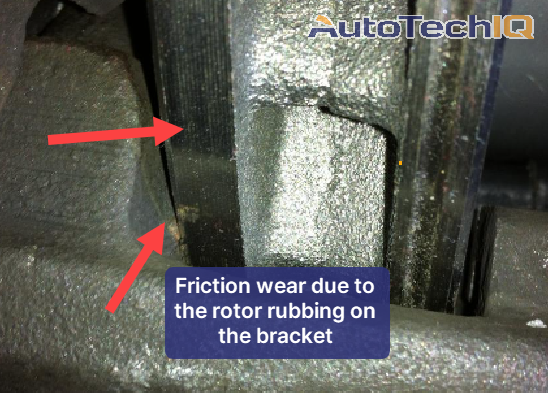 A rotor rubbing against other components because of a wheel bearing failure