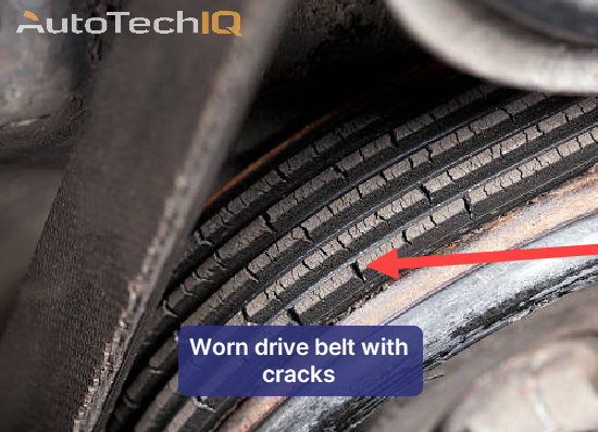 A cracked alternator drive belt requiring replacement